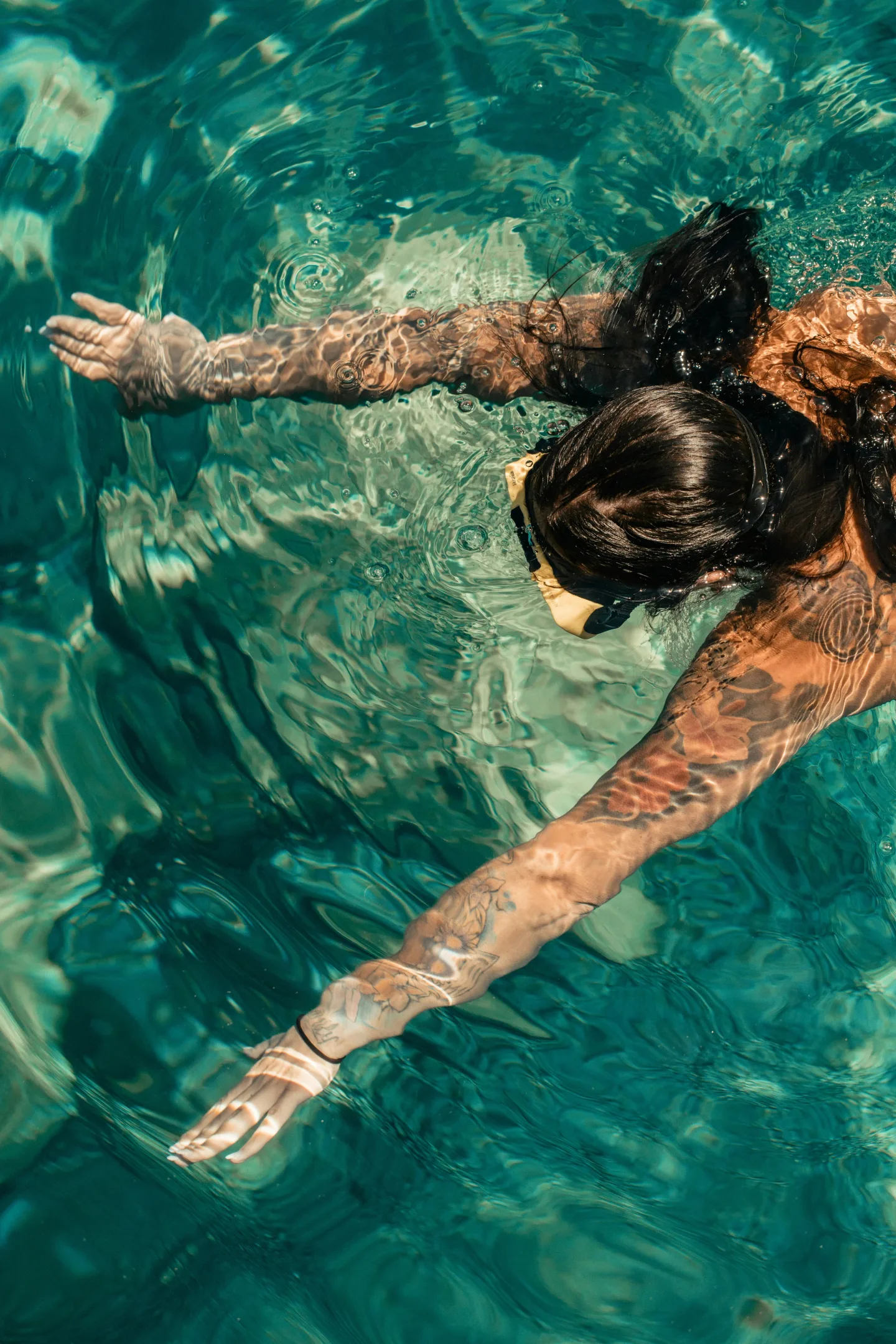 Snorkeling in the clear, calm shallows at Conch Shell Island